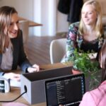 women sitting together