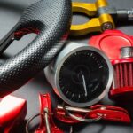 A close-up of red and silver sport car tuning equipment and accessories used for professional racers.