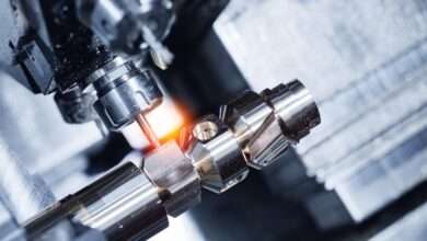 A metal CNC cutting tool in a manufacturing warehouse that uses precision technologies to its advantage.