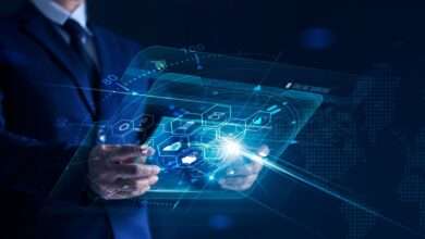 A businessperson is holding a modern virtual interface banking mobile device with an icon network connection.