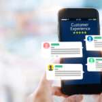A pair of hands holds a smartphone with the words "Customer Experience" and five stars on it. User reviews float in the air.
